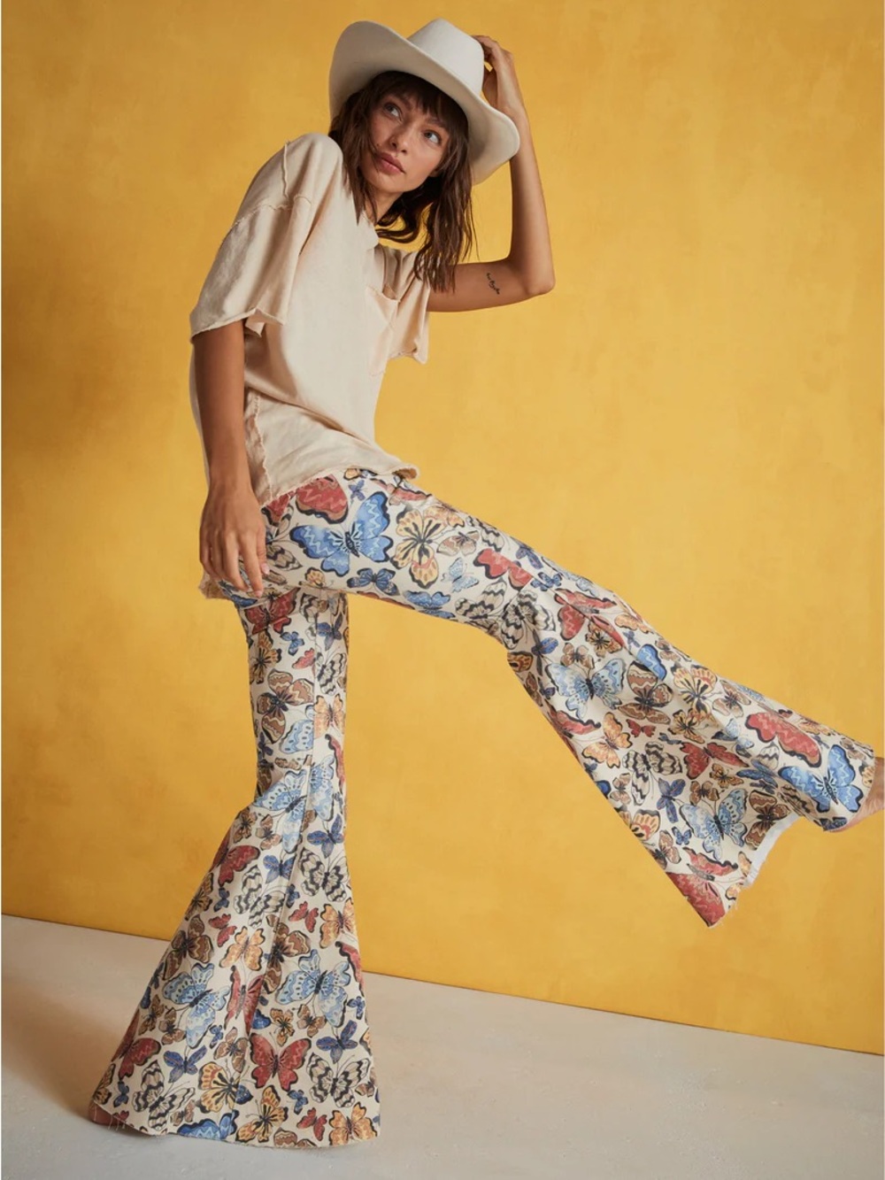 Free People just float on Floral Butterfly Flare Pants in Cream